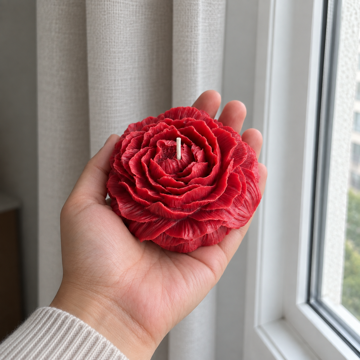 Peony Flower Soy Wax Candle held by hand showing the detailed sculptural petals and single wick