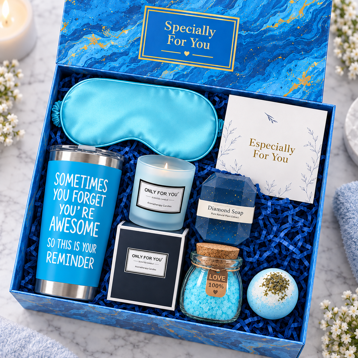 Open Relax & Unwind Gift Box with blue packaging and self-care gifts inside