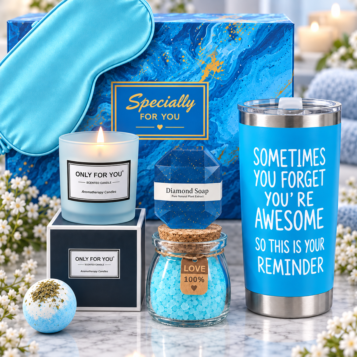 Close-up of Relax & Unwind Gift Box with tumbler, diamond soap, candle and bath salts